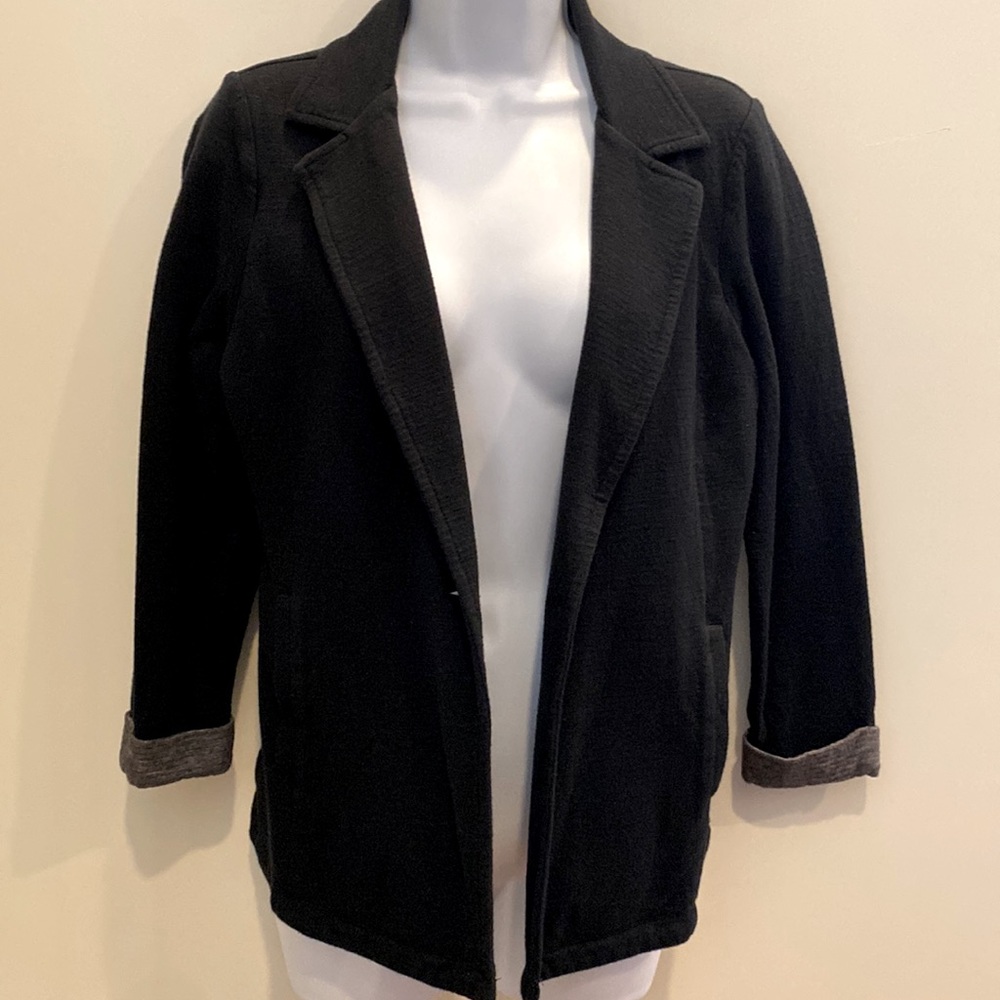 Matty M Medium black blazer with 3/4 sleeves decorated with pin stripes.